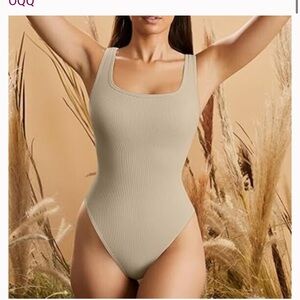 QQQ women’s size large cream bodysuit